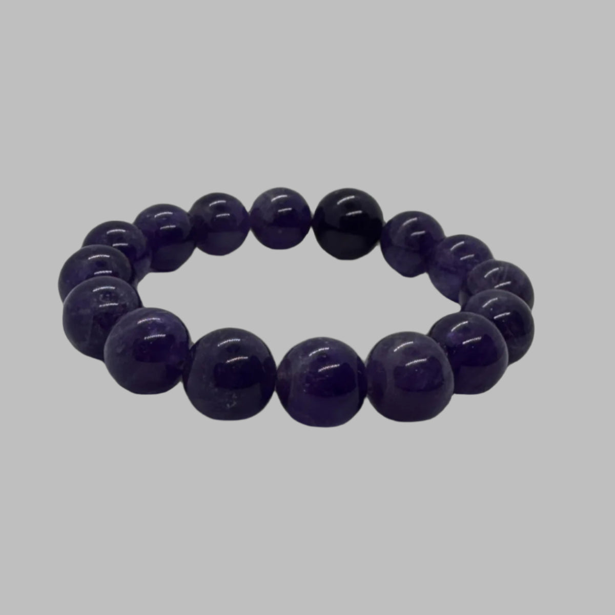 Amethyst stretch bracelet shown from an angled view