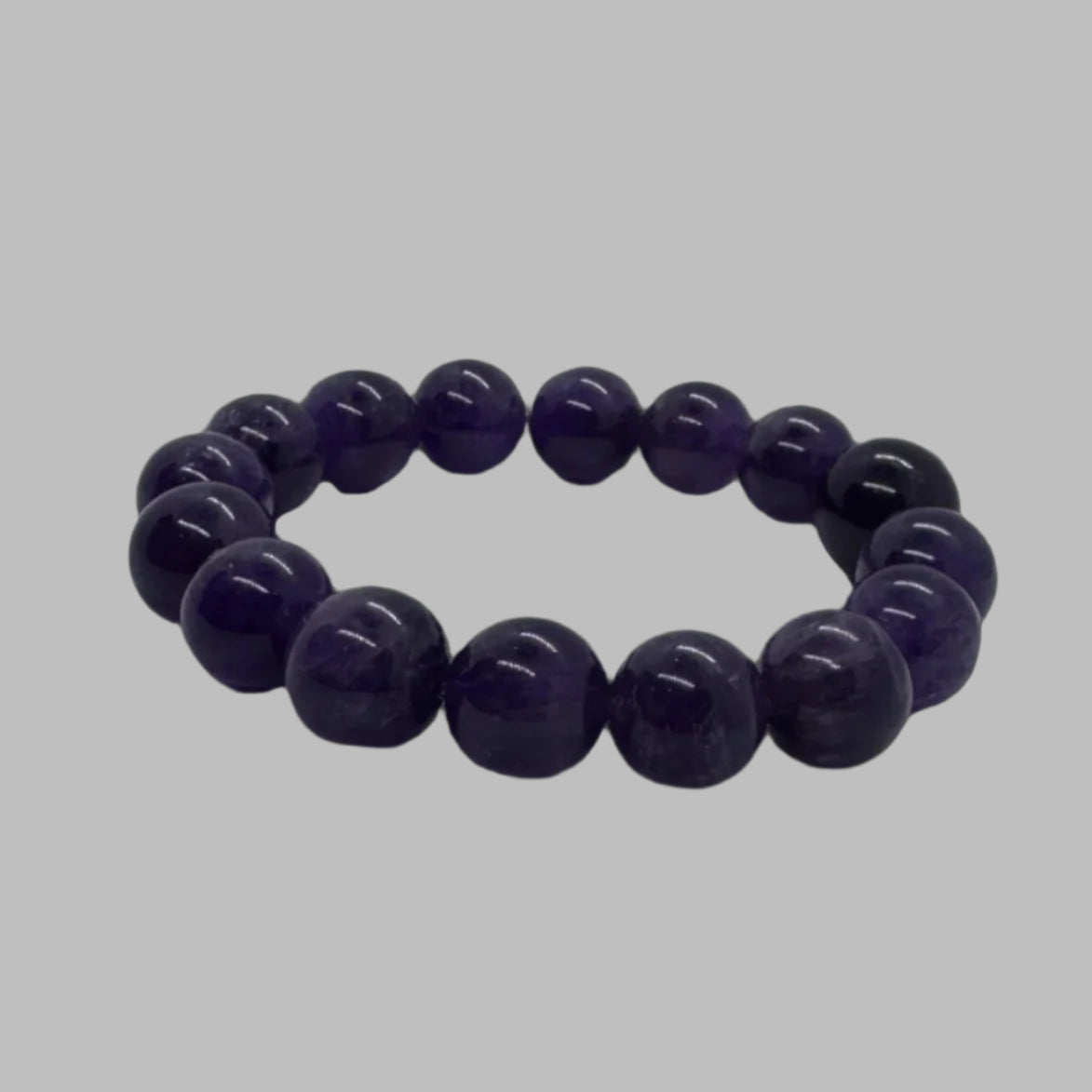 Close up of natural purple amethyst bracelet beads