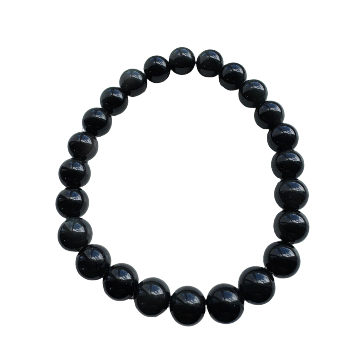 Overhead view of gloss black obsidian bracelet beads