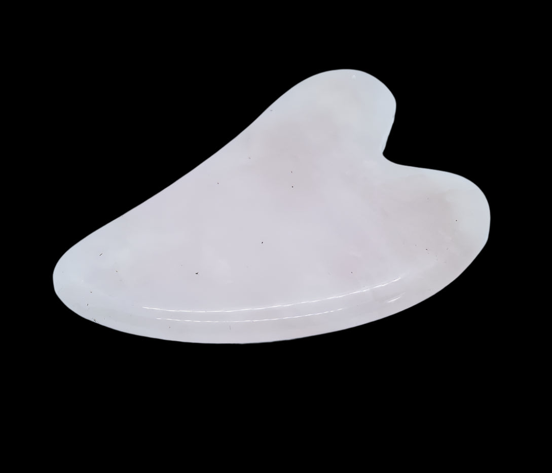 Smooth rose quartz gua sha facial massage tool